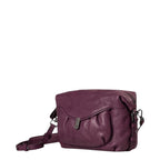 Lieblingstasche Mrs. Cannoli purple leather crossbody bag with a front flap pocket and adjustable shoulder strap