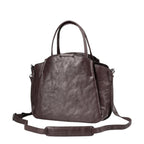 Lieblingstasche Mrs. Chiffon Pie dark brown leather handbag with top handles and an adjustable shoulder strap.