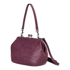 Lieblingstasche Mrs. Pizzelle purple leather handbag with a vintage-style kiss-lock clasp and shoulder strap.
