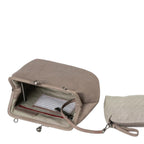 Lieblingstasche Mrs. Pizzelle taupe leather handbag with a kiss-lock clasp and an open interior featuring a striped lining.