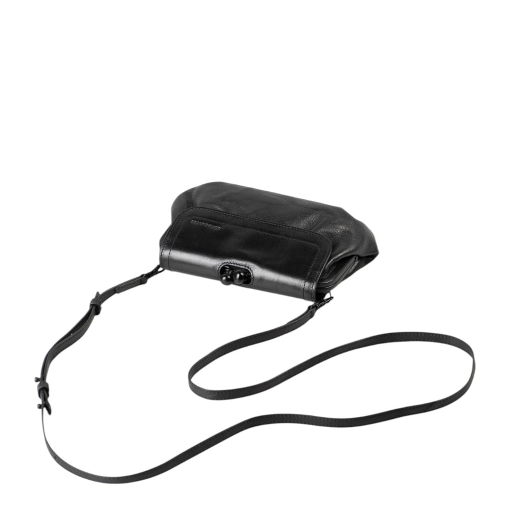 Lieblingstasche Mrs. Whoopie Pie black leather crossbody bag with a vintage-style kiss-lock clasp closure.