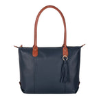 Lieblingstasche Lucia L navy blue leather tote bag with tan leather straps and tassel detail.