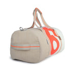 Lieblingstasche Pirat duffel bag in beige and white canvas with vibrant orange accents and large number print