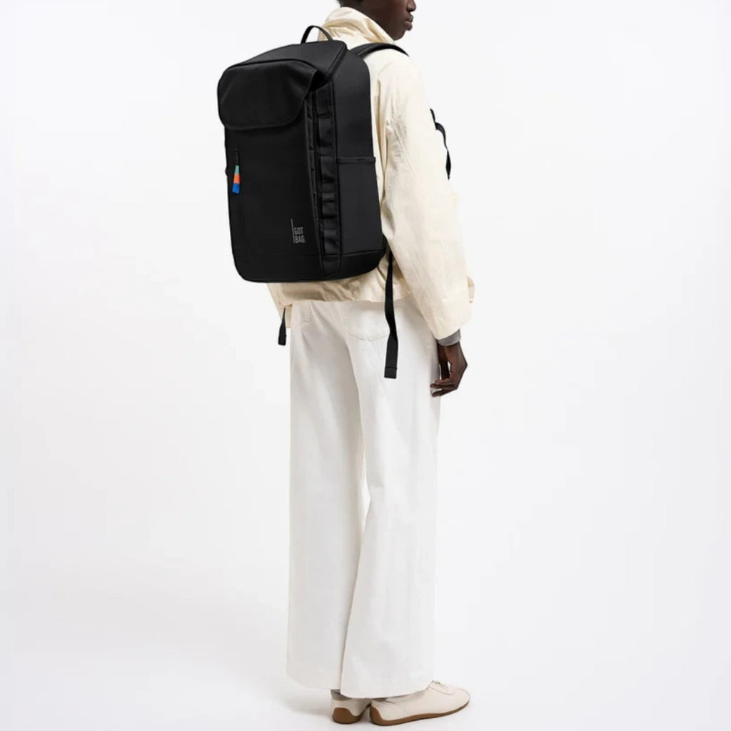 Lieblingstasche Pro Pack black laptop backpack worn by a model against a white background