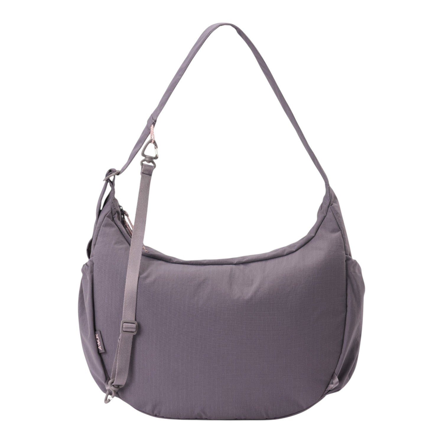 Lieblingstasche slouchy hobo bag in muted purple nylon with an adjustable shoulder strap and side pockets.