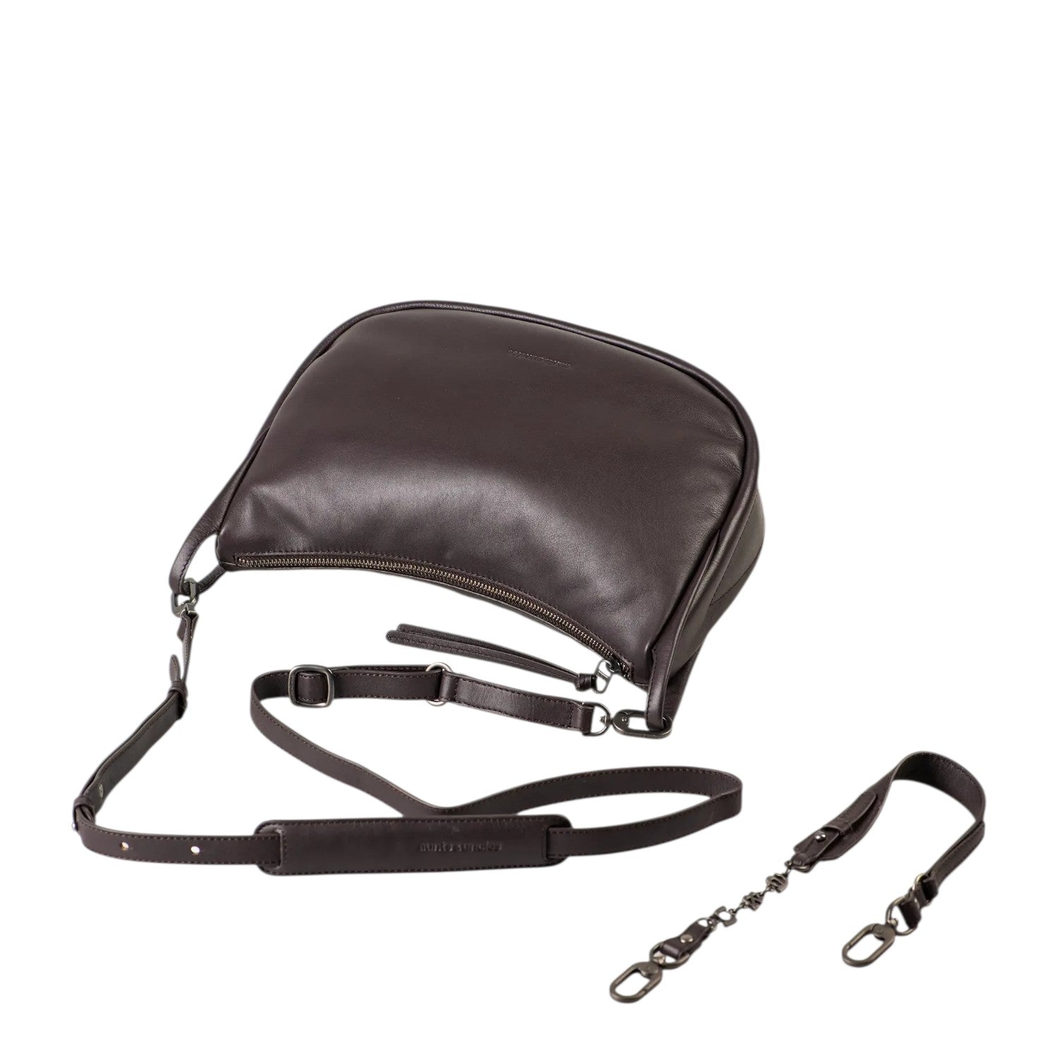 Lieblingstasche Raven dark brown leather crossbody bag with an adjustable strap and detachable chain detail