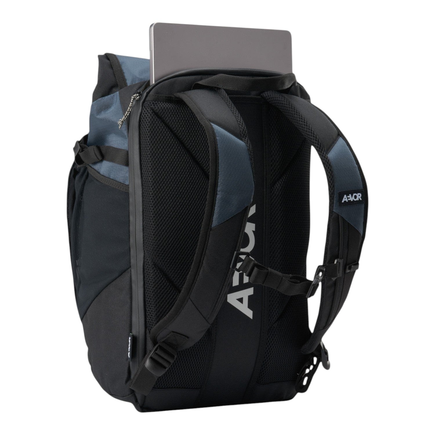 Lieblingstasche Roll Pack 2.0 backpack in black and blue with a laptop stored in the rear compartment