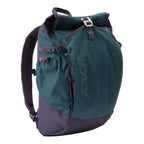 Lieblingstasche Roll Pack 2.0 backpack in teal and dark purple with a roll-top closure and adjustable straps.