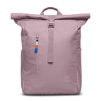 Lieblingstasche Rolltop Easy backpack in dusty rose, with a roll-top closure, front zip pocket, and side pockets. Features a colorful zipper pull.