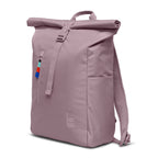 Lieblingstasche Rolltop Easy backpack in dusty rose, with a roll-top closure and buckle, side pocket, and colorful zipper pull.