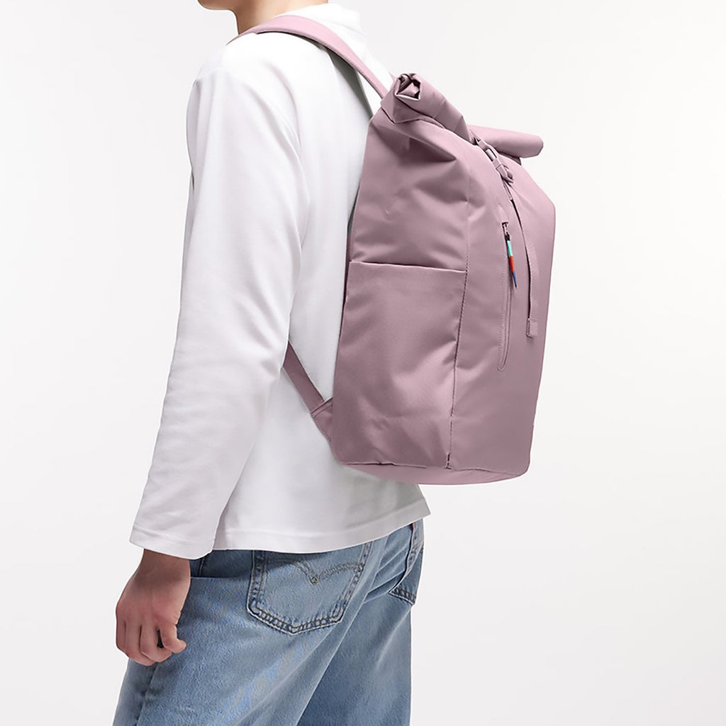 Lieblingstasche Rolltop Easy backpack in dusty rose pink, with a roll-top closure and front zip pocket.