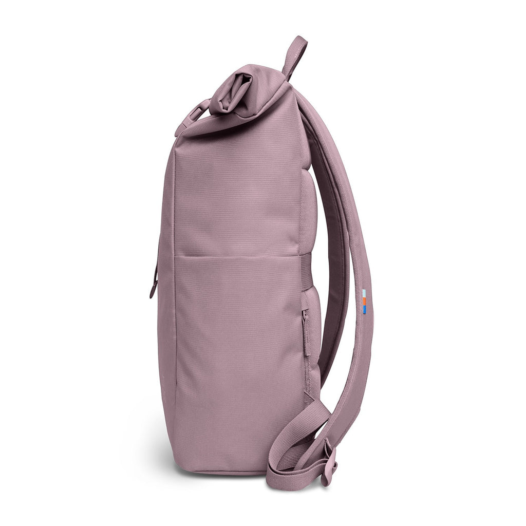 Lieblingstasche Rolltop Easy backpack in dusty rose pink fabric with a rolltop closure and side zip pocket.