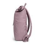 Lieblingstasche Rolltop Easy backpack in dusty rose pink fabric with a rolltop closure and side zip pocket.