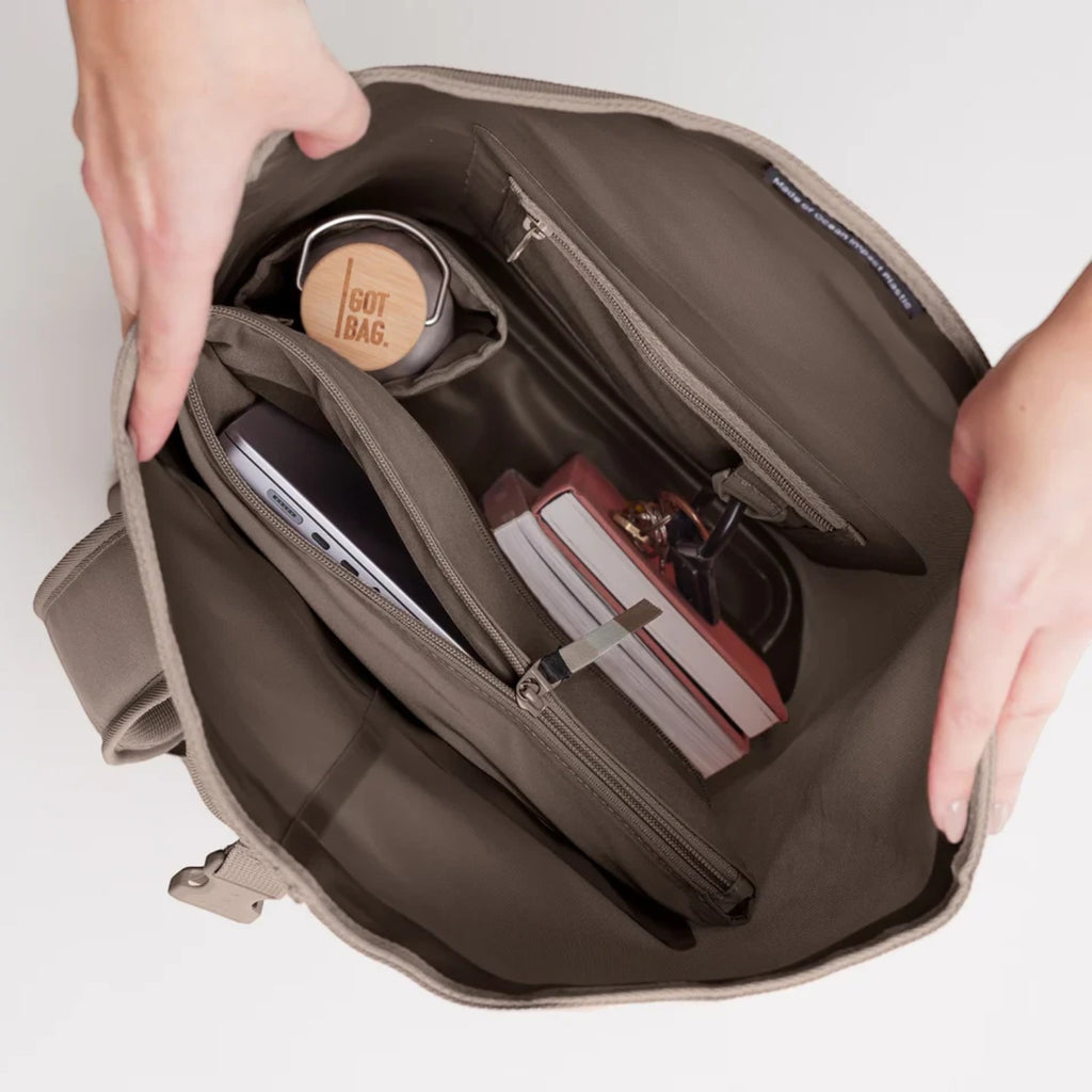 Lieblingstasche GOT BAG Rolltop Lite 2.0 backpack interior showing laptop sleeve, water bottle, and organized pockets