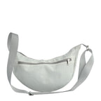 Lieblingstasche Roop moonbag made of water-repellent white sailcloth with an adjustable strap and zipper closure.