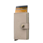 Lieblingstasche Secrid Miniwallet Pebble in beige textured leather with metallic card protector and snap button closure