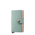 Lieblingstasche Secrid Miniwallet in light green pebble leather with a secure snap button and metal card protector.