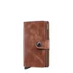 Lieblingstasche Secrid Miniwallet Vintage in brown leather with snap button closure and integrated card protector