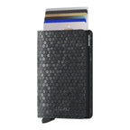 Lieblingstasche Secrid Slimwallet Hexagon in black leather with RFID-protected aluminium card protector and cards.