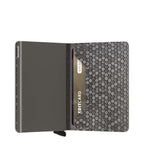 Lieblingstasche Secrid Slimwallet Hexagon in grey with a geometric honeycomb pattern and integrated card protector.