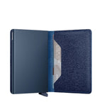 Lieblingstasche Secrid Slimwallet in navy blue leather with a metallic card protector and RFID protection.