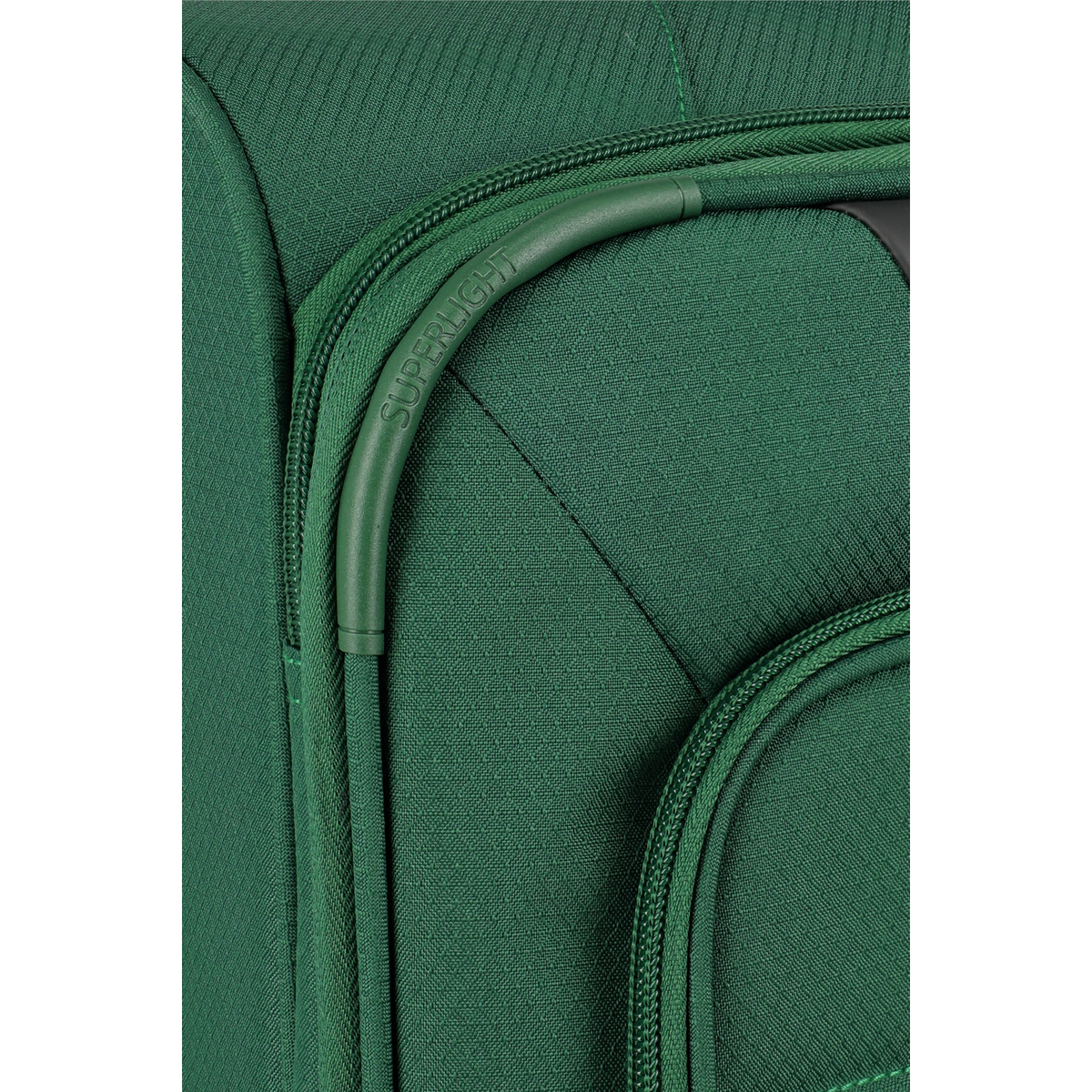 Close-up of a green Lieblingstasche Skaii trolley suitcase featuring durable fabric and a Superlight handle detail.