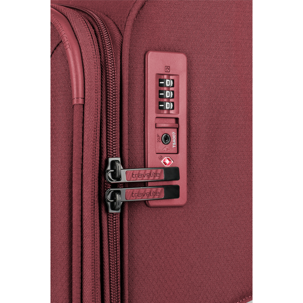 Lieblingstasche Skaii Trolley M suitcase featuring a red fabric exterior with a secure TSA combination lock