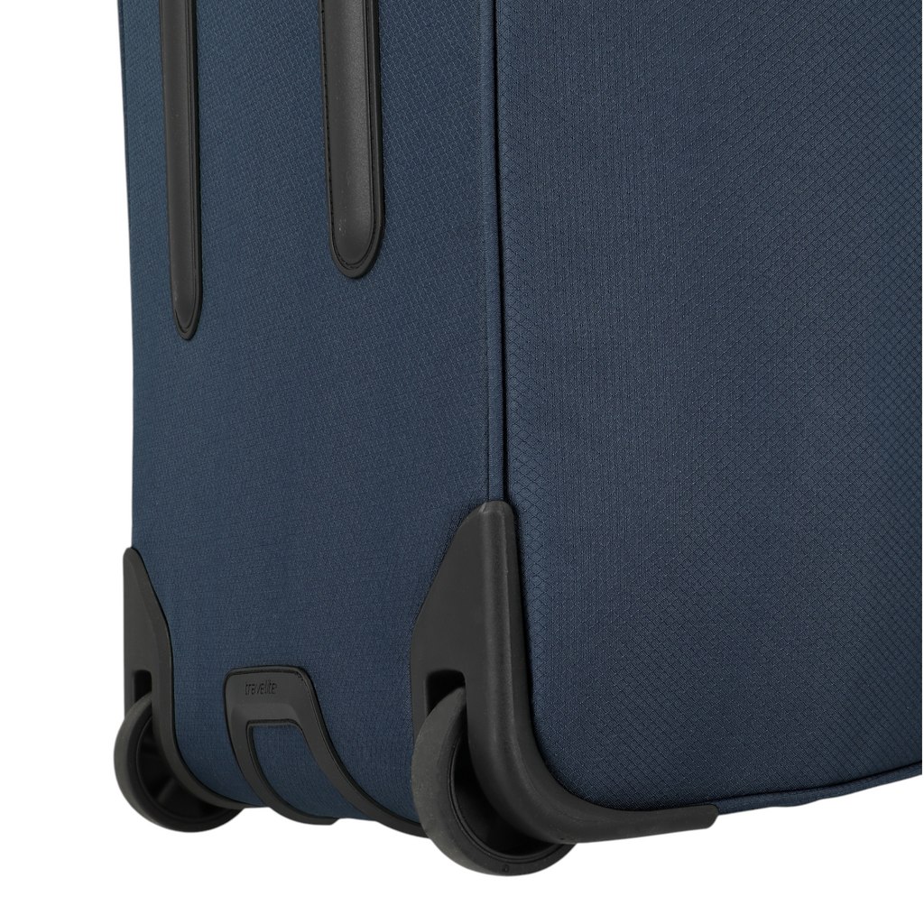 Lieblingstasche Skaii wheeled duffle bag in dark blue fabric with durable black corner wheels and protective casing