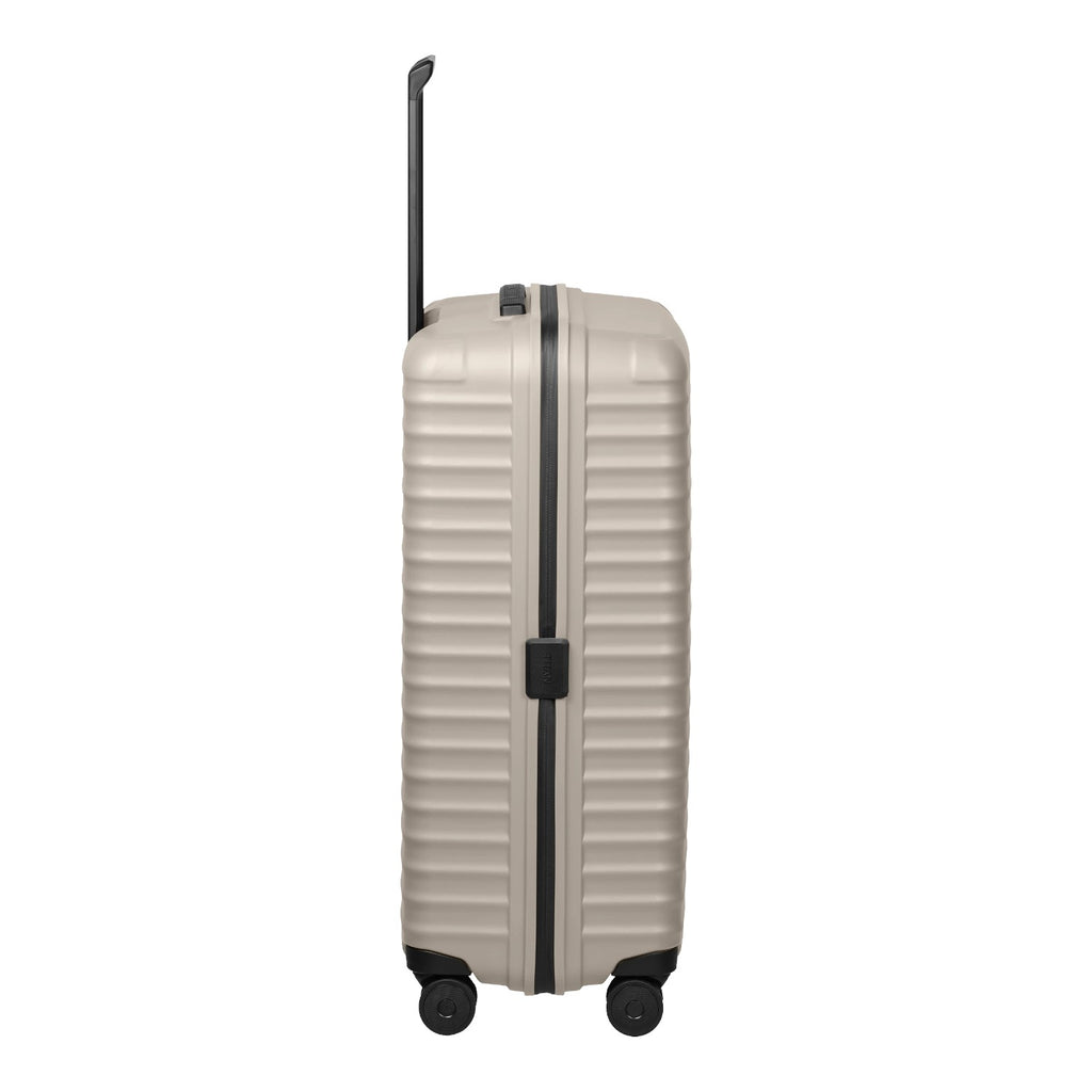 Lieblingstasche UPGRADE 4w Trolley L in beige with a ribbed hard shell design and black telescopic handle