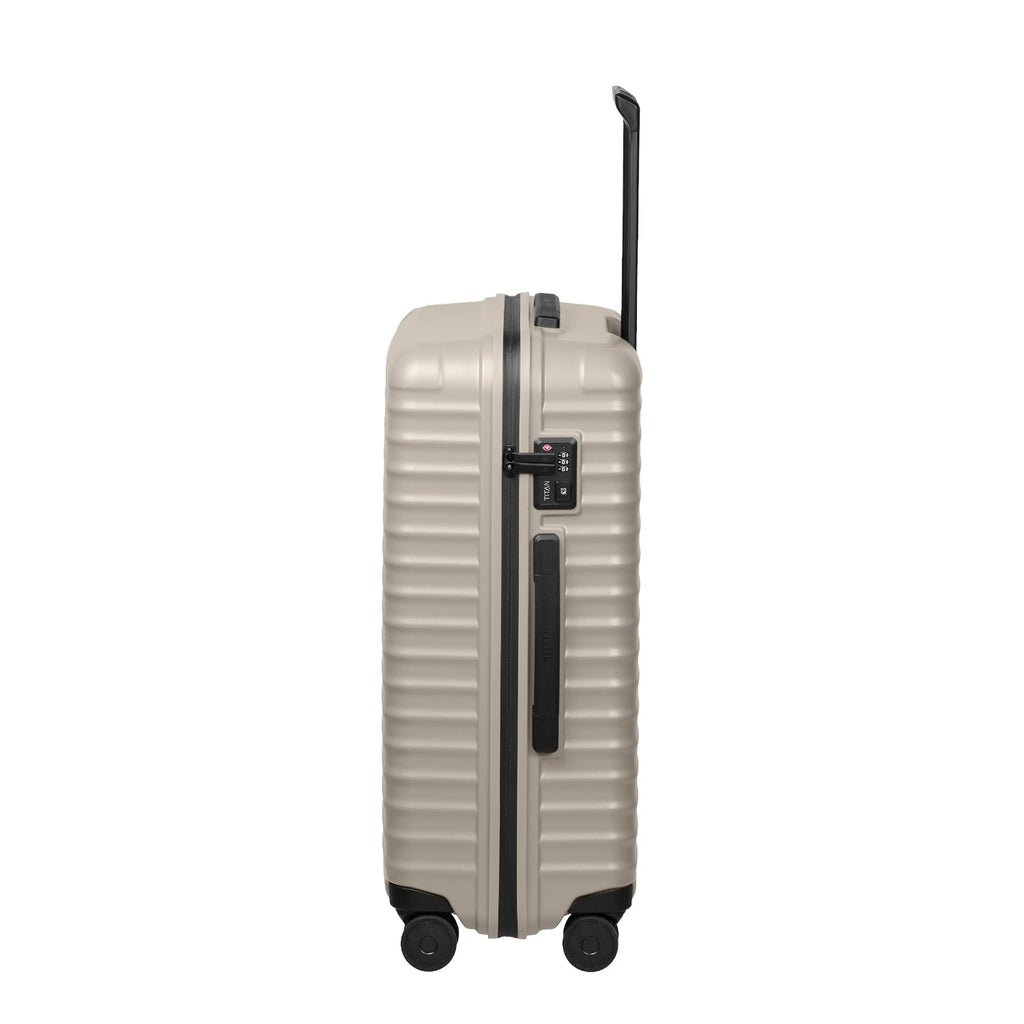 Lieblingstasche UPGRADE 4w Trolley M+ in beige with a side view showing the TSA lock and retractable handle