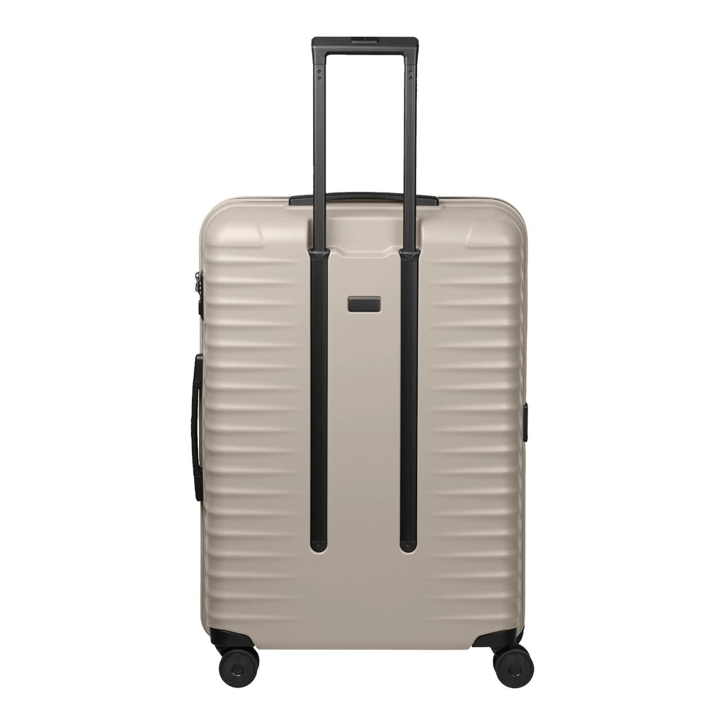 Lieblingstasche UPGRADE 4w Trolley L in beige with a hard shell, telescopic handle, and four smooth-rolling wheels.