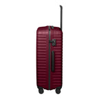 Lieblingstasche UPGRADE 4w Trolley L in dark red with a ribbed hard shell, side handle, and integrated TSA lock.