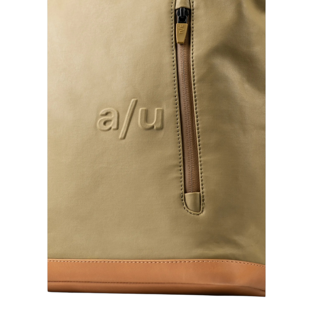 Lieblingstasche Wakayama backpack in olive green synthetic fabric with tan leather trim and embossed a/u logo detail