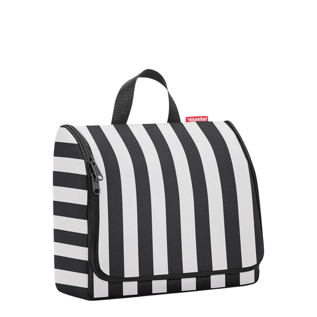 Lieblingstasche Toiletbag XL in black and white vertical stripes with a convenient top carry handle
